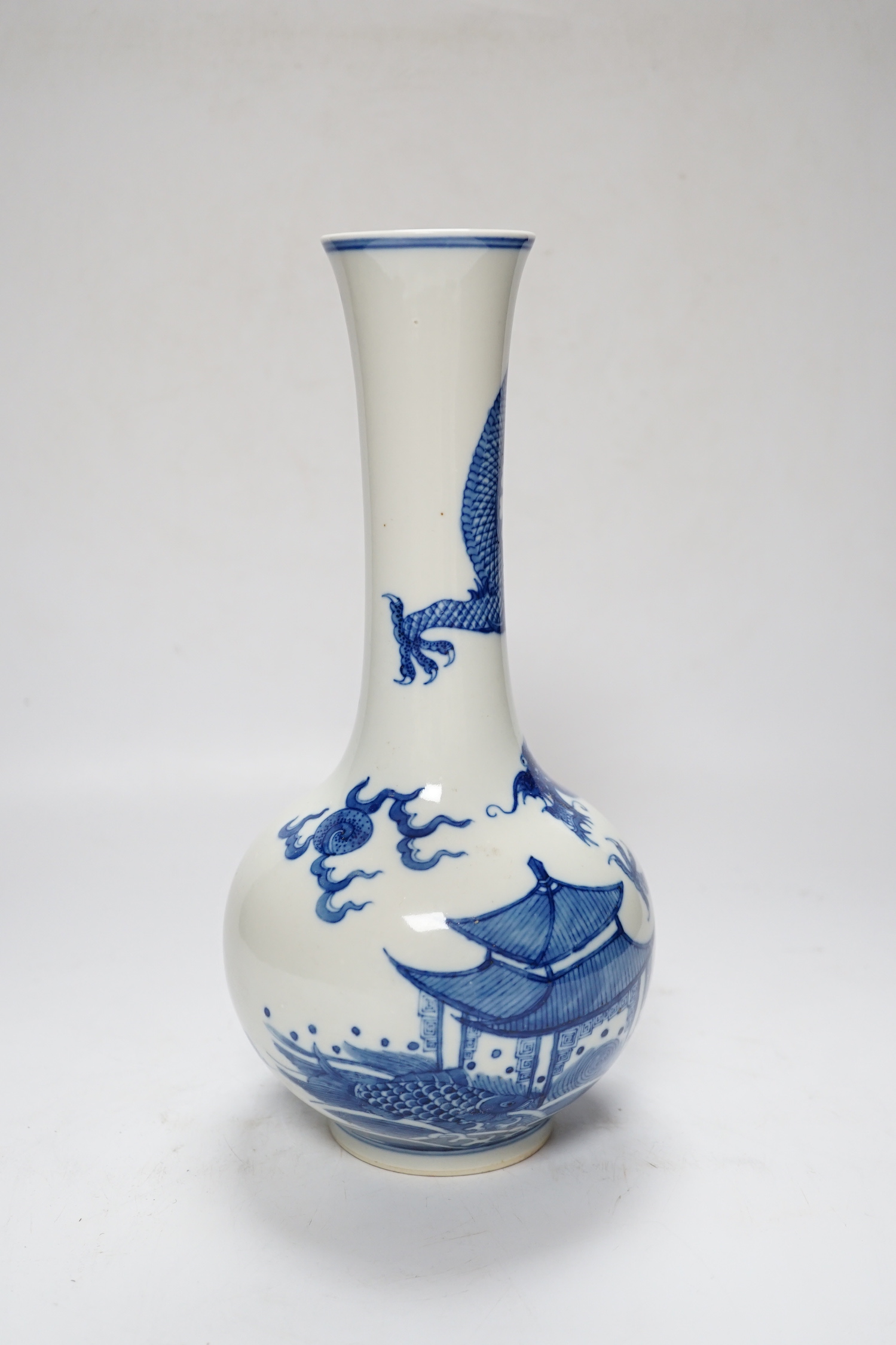 A Chinese blue and white dragon vase, 27cm high